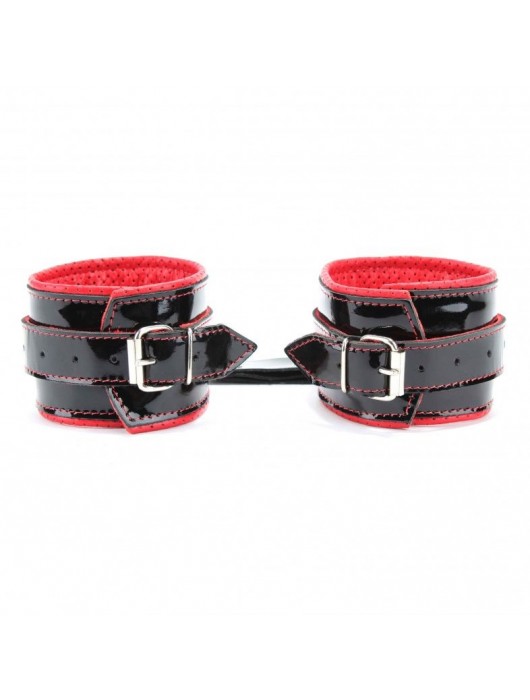 Лаковые чёрно-красные перфорированные наручники - БДСМ Арсенал - купить с доставкой в Сызрани